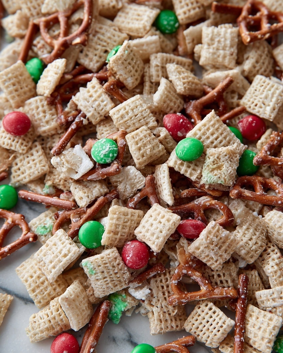 The image shows a close-up of a snack mix made of several layers blended together, including light tan square cereal pieces with a grid pattern, thin brown pretzel sticks, and round small candy-coated pieces in red and green colors. The ingredients are lightly coated with a white, creamy substance holding them together in irregular clusters. The mix is spread out on a flat surface with a white marbled texture visible in the background, giving a clean and bright look to the photo taken with an iphone --ar 4:5 --v 7