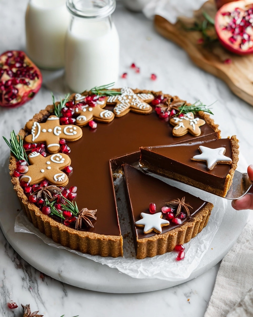 A round tart with three visible layers: a crispy golden-brown crust forming the base and sides, a thick, smooth middle layer of milk chocolate filling, and a shiny, slightly darker chocolate glaze topping the filling. The tart is garnished along one edge with white star-shaped cookies, small gingerbread men with white icing smiles and buttons, bright red pomegranate seeds, fresh green rosemary sprigs, and brown star anise pods. Three slices have been cut and slightly lifted, showing the smooth chocolate layers inside. The tart rests on white parchment paper covering a round white marble surface. Two glass bottles filled with milk stand in the background on the white marbled surface, alongside a wooden board with a halved pomegranate. A woman's hand is holding a spatula lifting one slice of the tart. Photo taken with an iphone --ar 4:5 --v 7
