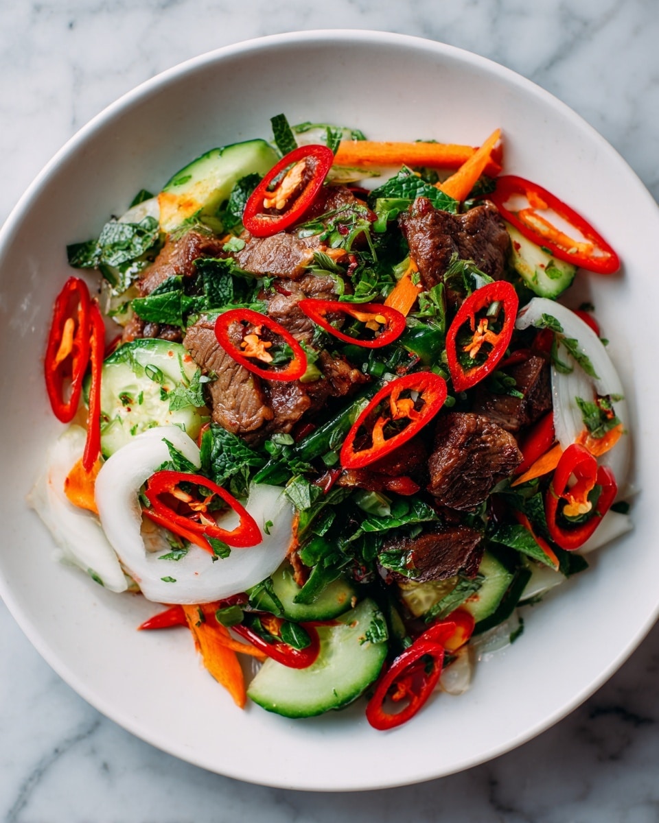 This dish is a colorful mix of sliced meat and fresh vegetables on a white plate, placed on a white marbled surface. The bottom layer has thick slices of white onion and green cucumber with their smooth skin. Above that, there are bright orange carrot slices and chopped green herbs, giving a fresh, crunchy look. Thick, succulent pieces of cooked meat with a slightly wrinkled texture sit scattered throughout. Thin slices of red chili peppers with seeds are spread on top, adding a vibrant contrast. The whole dish shows a fresh and lively mix of textures and colors, with the glossy shine of the meat and vegetables making it look very appetizing. photo taken with an iphone --ar 4:5 --v 7