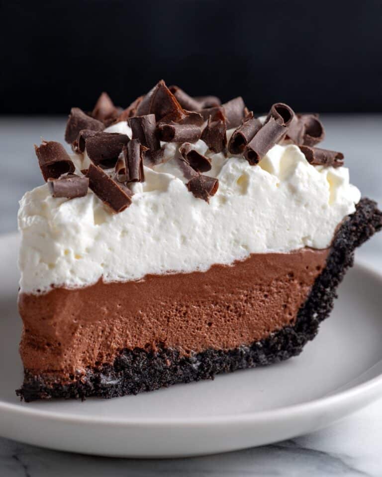 Chocolate Espresso Pudding Pie with Whipped Cream and Chocolate Curls Recipe